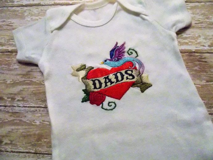 great Father's Day gift ideas for new dads | this cool DADS tattoo onesie at Sew Nerdy Gifts