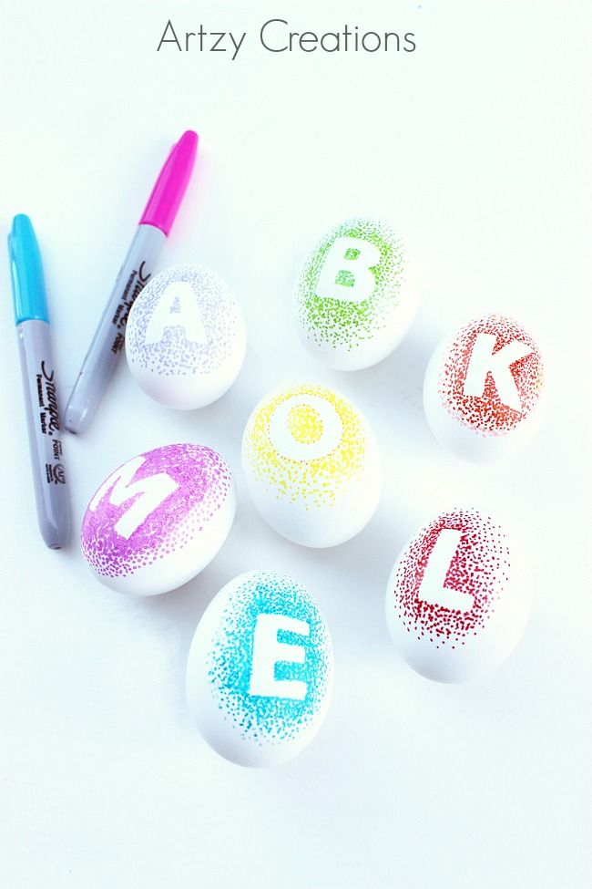 Monogrammed Easter eggs using stencils and Sharpies from Artzy Creations