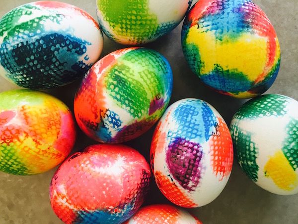 The easiest way to get bright colorful Easter eggs: tie-dye them. Here's how.