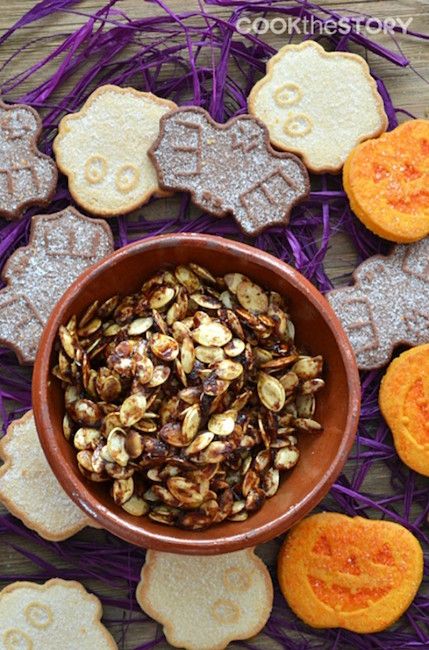 Fall flavors coat these Maple Pumpkin Spice Roasted Pumpkin Seeds. If you don't know how to roast pumpkin seeds yet, this recipe will inspire you! | Cook The Story