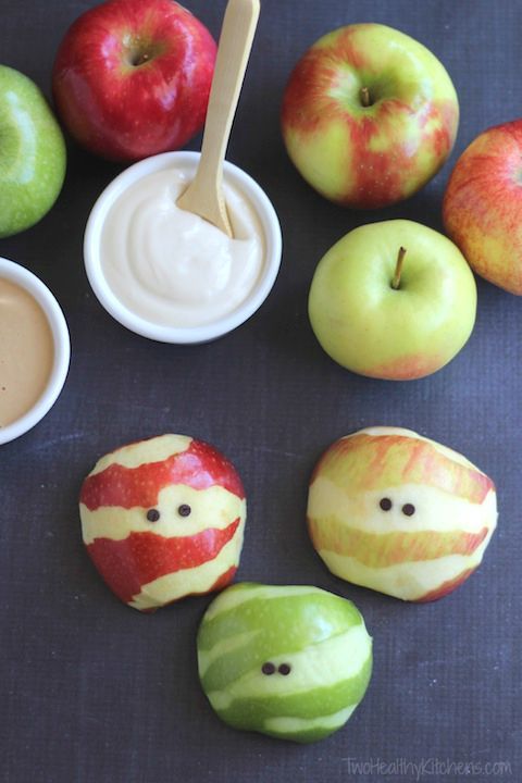 How cute are these Apple Mummies? Cute non-candy Halloween snack, and fun enough to distract the kids from the fact that they aren't candy! | Two Healthy Kitchens