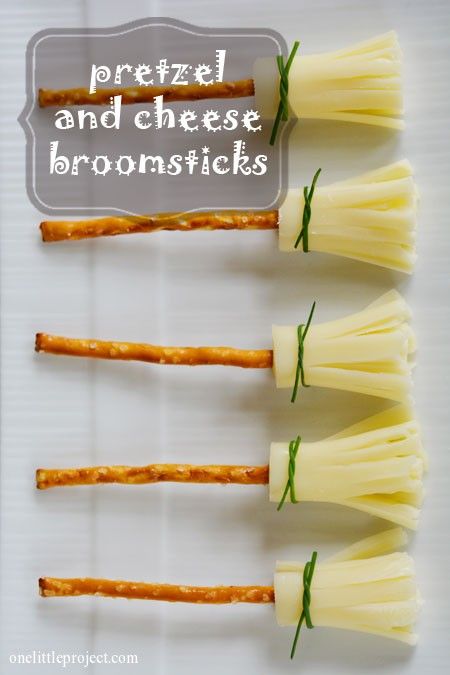 Looking for non-candy Halloween snacks? These easy to make Pretzel and Cheese Broomsticks are adorable—and a healthier snack too! | One Little Project