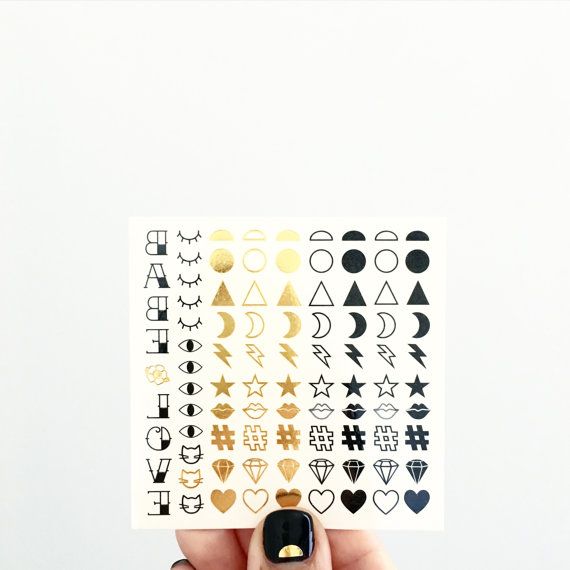 Fingernail temporary tattoos -- yes, this is a real thing (that we love) -- from Love & Lion.