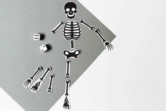 Not-scary Halloween crafts for kids: a printable skeleton game at All For the Boys