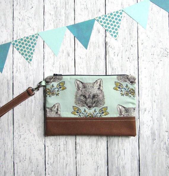 Make other envious with this faux suede Fox Clutch from Gable Made