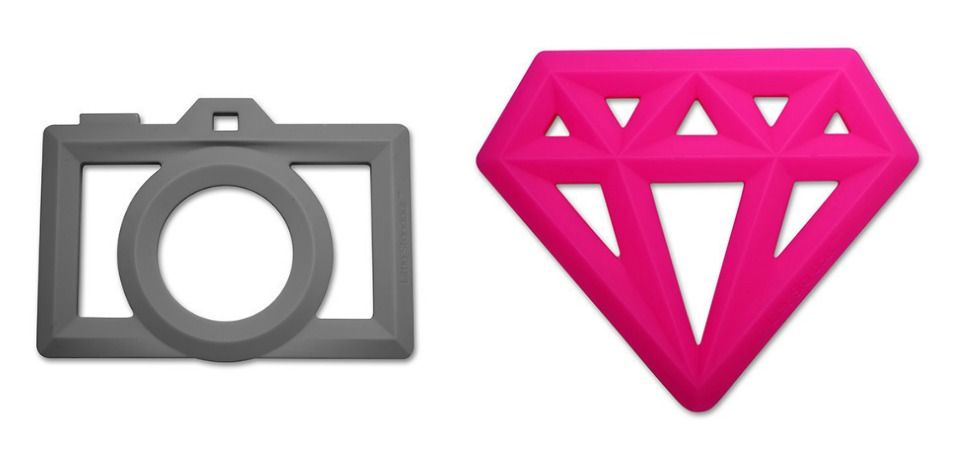 Iconic camera and diamond-shaped silicone teethers from Spearmint Love