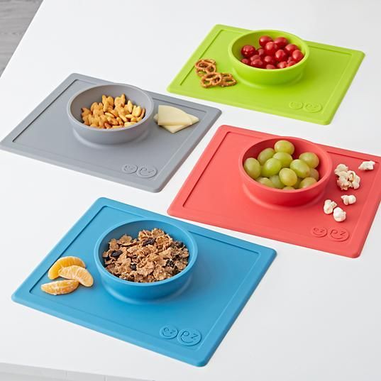 Fun finds for when you picnic in the living room with the family: EZPZ silicone placemats with bowls built in cling to the coffee table for less mess. | Cool Mom Eats