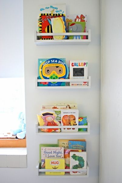 Kids' books organization: IKEA spice rack shelves by The Sweetest Digs