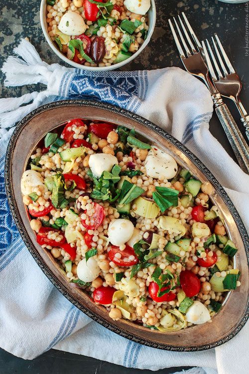 Although couscous is more a wheat than grain, we included it in our guide to healthy grains because our kids love it! Try the gorgeous–and adaptable–Israeli Couscous Salad with Chopped Vegetables, Chickpeas and Artichokes for a substantial salad. | The Mediterranean Dish. 