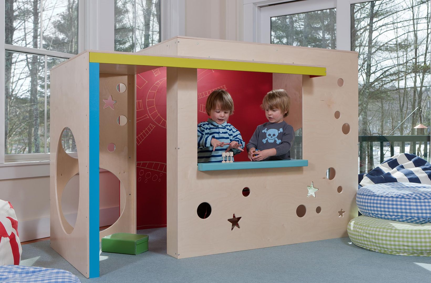 CedarWorks makes some of the coolest indoor playhouses for kids.