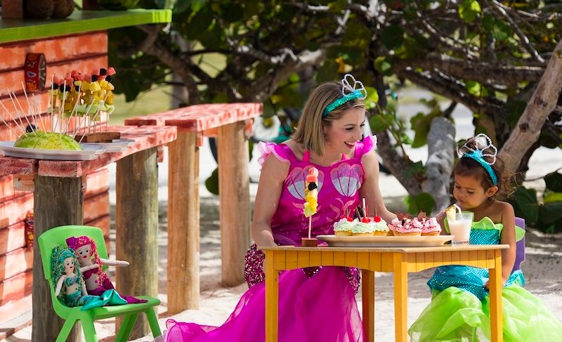 Hotels with coolest amenities for kids: Book a mermaid tea party on the beach at Rosewood Hotel's Jumby Bay Resort in Antigua
