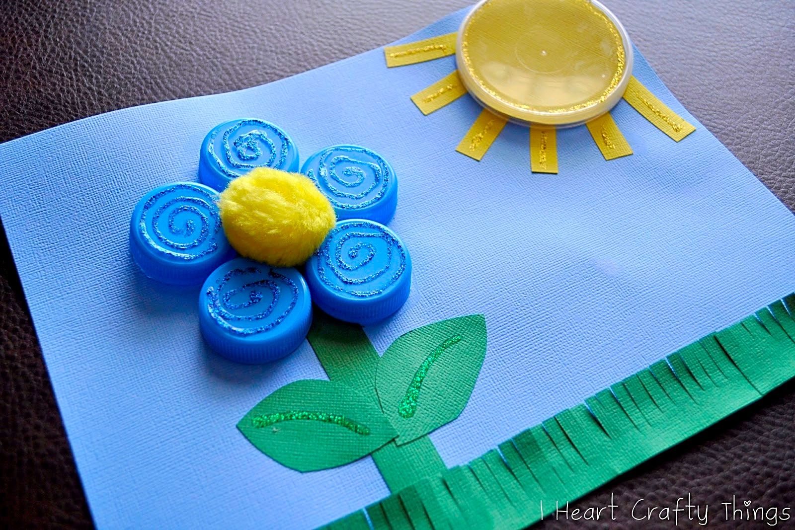 Flower crafts for kids: Bottle Cap Flower by I Heart Crafty Things