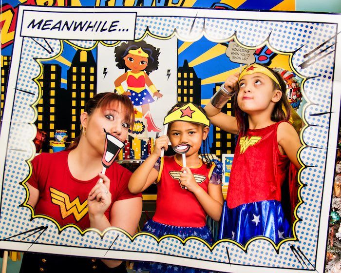 Superhero party themes for girls: Wonder Woman Photo Booth at Bella C Parties