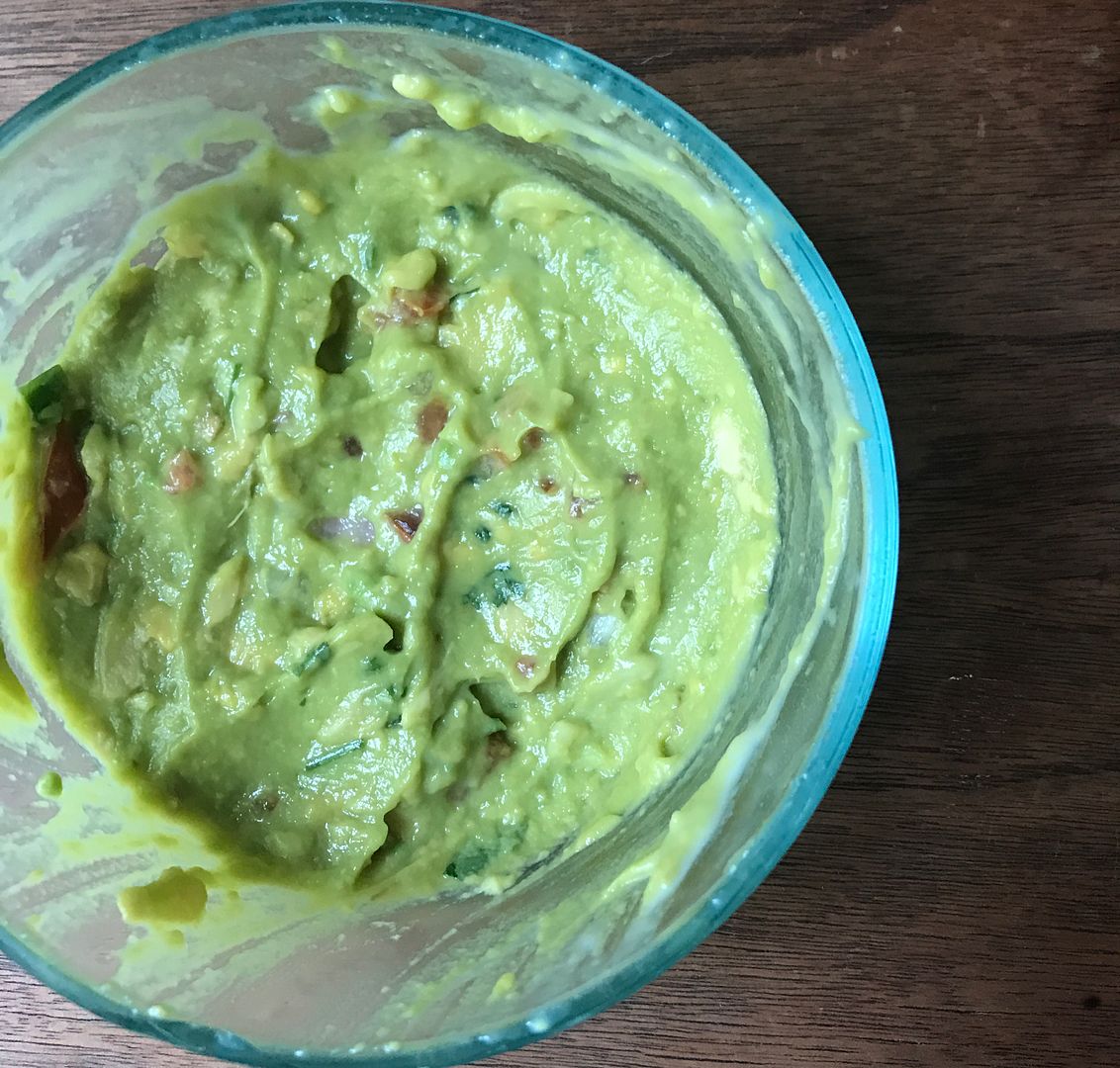 Guacamole that's been in the fridge for a few days after using our trick for how to keep it from browning. Works every time. Genius! | Cool Mom Eats