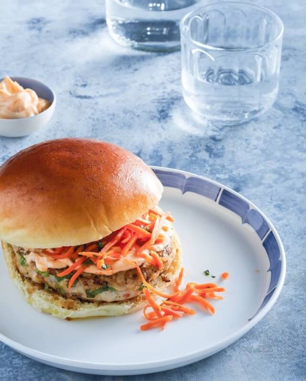 Sriracha is one of my top food products; Mixed with a little mayo, it makes the perfect topping for Thai Chicken Burgers with Quick Pickled Carrots. | The Steamy Kitchen.