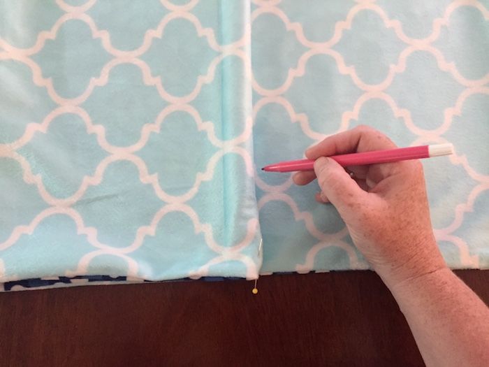 DIY weighted blanket tutorial: Mark the folded edges with a marker or straight pin (or both!) | Photo © Kate Etue