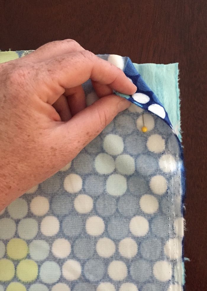 DIY weighted blanket tutorial: Lay fabric right sides together and three sides, leaving the top edge open. | Photo © Kate Etue