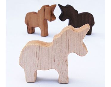 handmade wooden unicorn rattle at manzanita kids | baby shower gift guide handmade wooden unicorn rattle at manzanita kids | baby shower gift guide