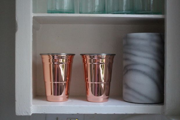 These pretty copper party cups—a modern take on the ubiquitous Solo plastic cup—is pretty enough to display. | Cupcakes and Cashmere 