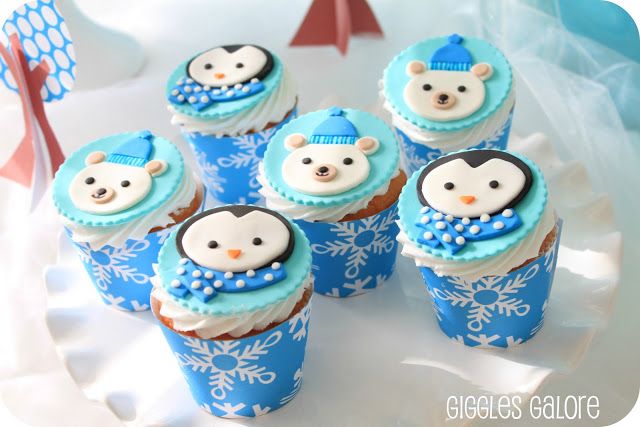 Winter birthday party themes: penguin and polar bear cupcake toppers at Giggles Galore