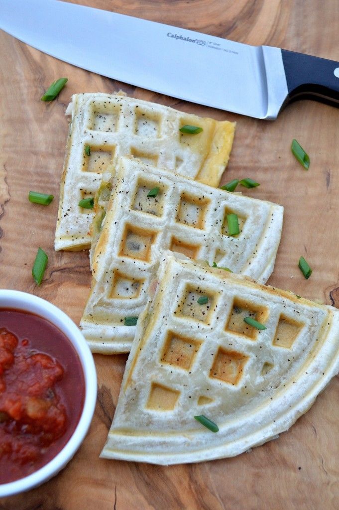 Waffle iron recipes for dinner: Forget the pan. These Easy Chicken & Cheese Quesadillas Cooked in a Waffle Iron come together in minutes and don't require you to hover over the stove. | Souffle Bombay