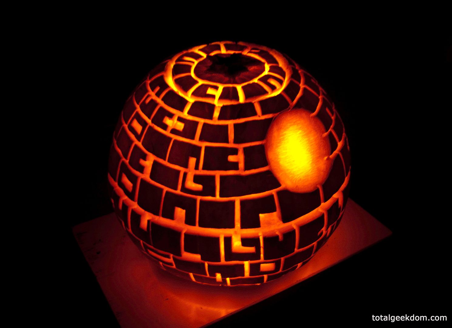 Pop on a Star Wars movie (or three) and get to work on this cool Death Star Pumpkin from Total Geekdom. 