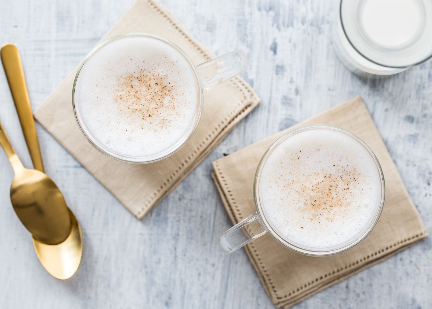 Holiday cocktails and mocktails: Try this super rich and delicious Milk Punch Two Ways from Jelly Toast. It's the ultimate crowd pleaser!
