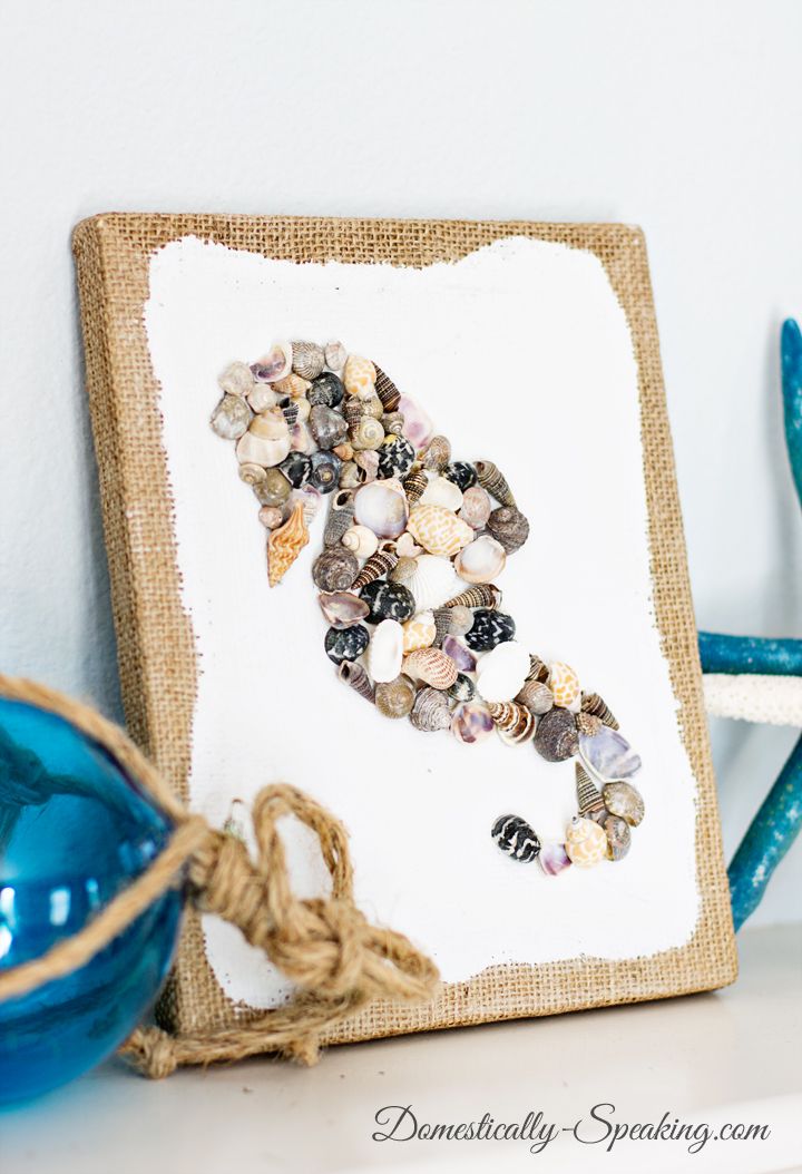 This pretty seashell seahorse art project would look great on the wall! Via Domestically Speaking