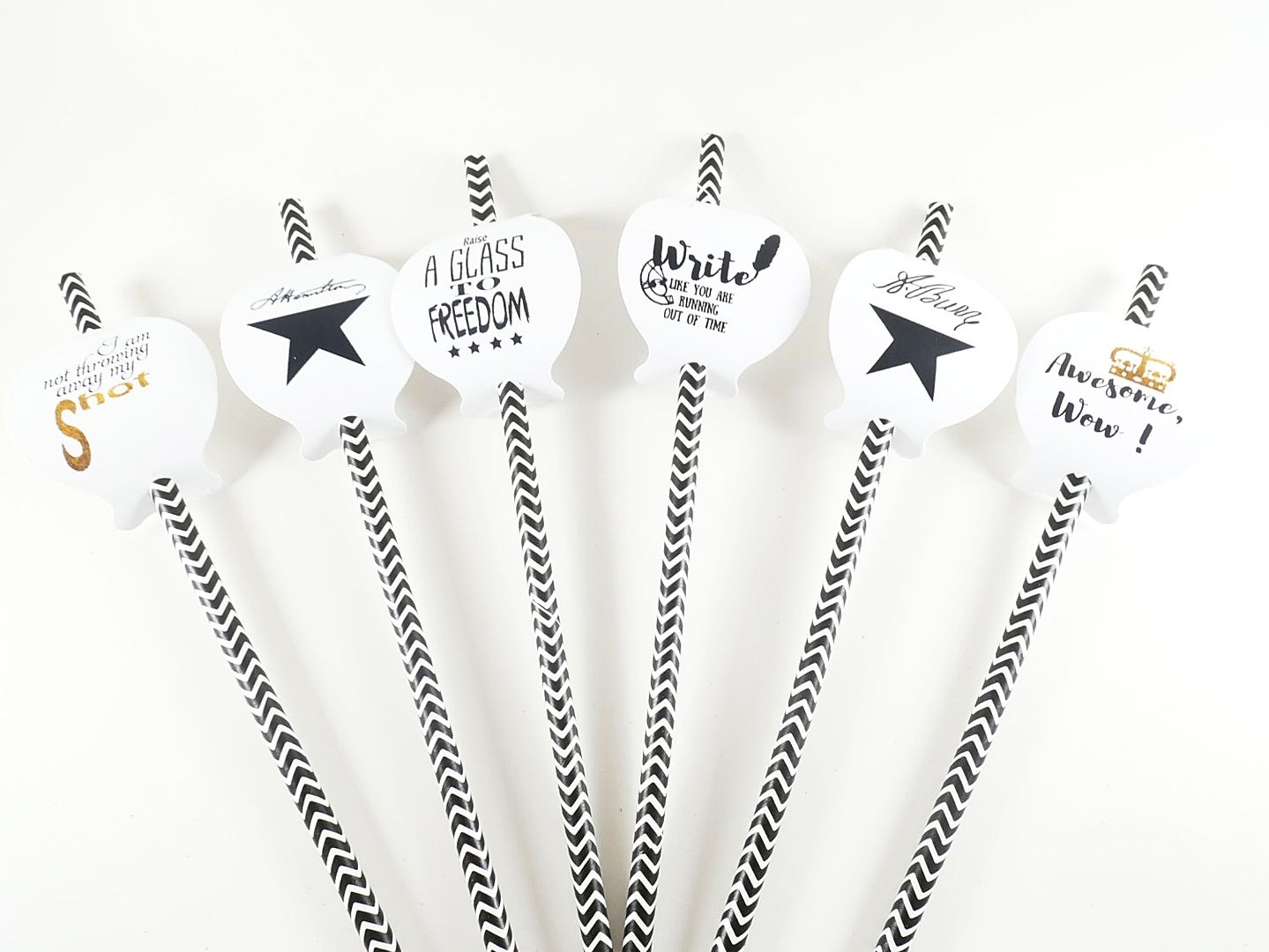 Hamilton party ideas: paper straws with Hamilton quotes from Hello Party Crafts