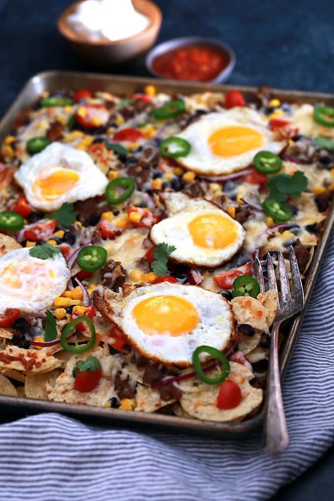 Pantry dinner recipes: Thanks to Melanie at Melanie Makes for taking nachos up a notch with these Huevos Rancheros Sheet Pan Nachos. 