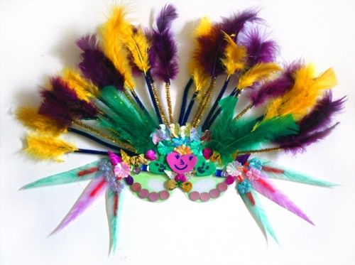 DIY Mardi Gras masks for kids: festive feathery Mardi Gras Mask at Alpha Mom. 