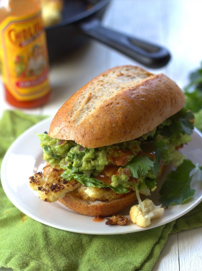 Loving this Mexican Cauliflower Steak and Guacamole Sandwich from Connoisseurus Veg. So much lighter than the original!