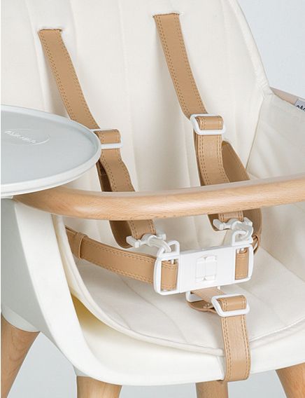 Modern baby furniture: The wood and leather detailing on the Micuna OVO high chair. Just, whoa.