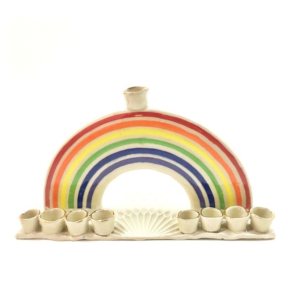 Menorahs for kids: This Rainbow Menorah is just so full of cheer! And since it's hand made out of porcelain, I think it'll make a sweet heirloom too. | Make Good Choice