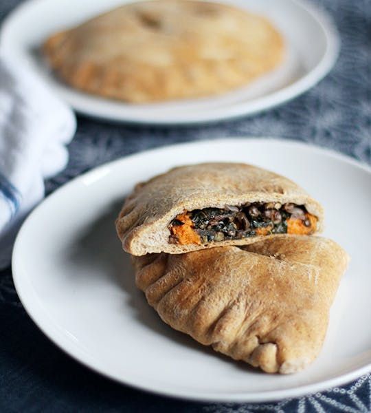 One-handed breastfeeding snacks: Load up on nutrition with these Spiced Lentil, Sweet Potato & Kale Whole Wheat Pockets at The Kitchn. Yum!