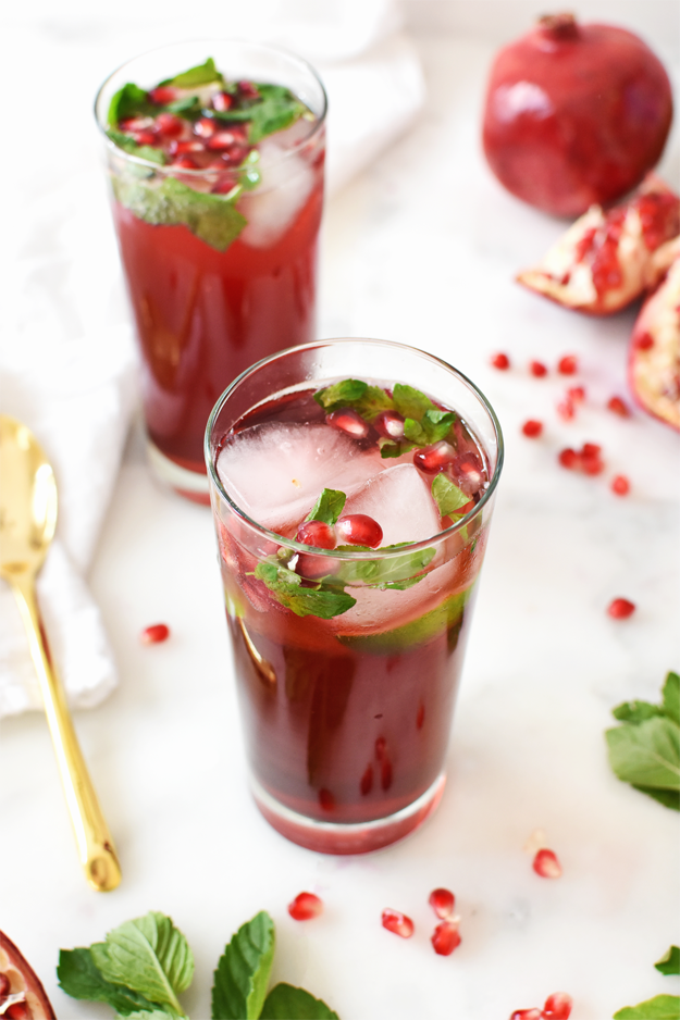 Holiday cocktails and mocktails: If your chances of a white Christmas (or Hanukkah!) are slim to none, try this cool Holiday Pomegranate Mojito Cocktail from The Butter Half. 