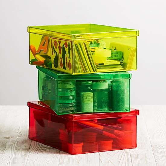 De-clutter kids' rooms with organized see-through or labeled storage bins like these from Land of Nod